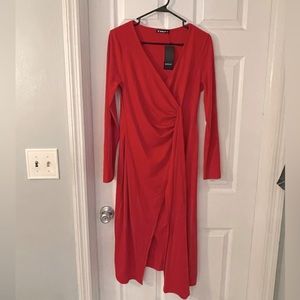 Red long sleeve dress. Slit down the side.